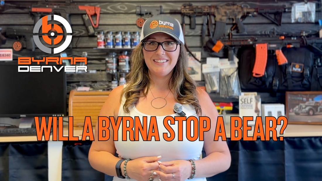 Image of woman inside Byrna Denver store front with the title "Will a Byrna Stop a Bear?"
