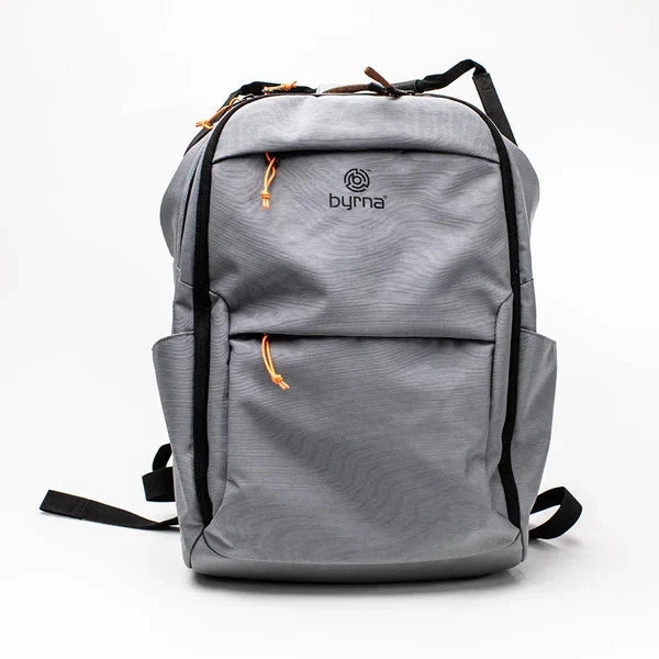 Gray backpack with Byrna logo and black straps on a white background.